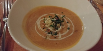 Curry butternut squash soup with apple and creme fraiche